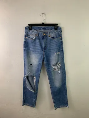 Distressed medium wash denim